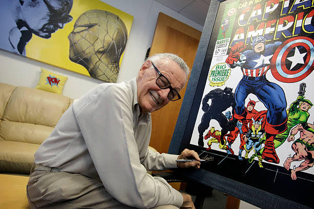 Stan Lee was part of the most important creative tandem in the history with Jack Kirby. Lee was writer, Kirby was artists, and their partnership produced the x?men, fantastic four, thor, hulk, magneto, the silver surfer and scores of other characters that have reached the movie screen or will soon. He is pictured here signing poster for an upcoming exhibit in his Beverly Hills office Sept. 15, 09.  (Photo by Barbara Davidson/Los Angeles Times via Getty Images)